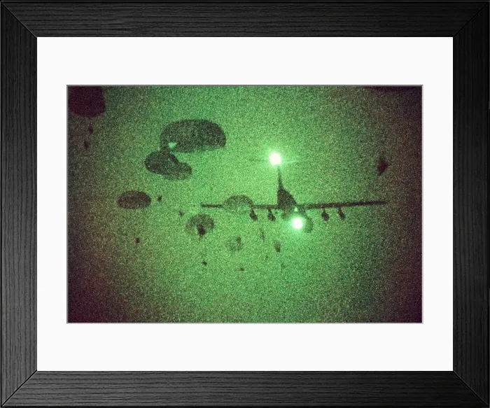 Framed Print : Night vision image of Paratroopers of the 82nd Airborne jumping from C-141 Starlifter aircraft. Sept. 12 1989. (BSLOC_2011_12_273)
