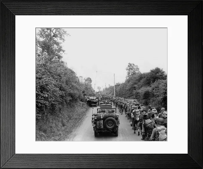 Framed Print : U.S. soldiers who landed on Omaha Beach on July 5-7, 1944, advancing to the town of Saint Lo. July 11, 1944, Normandy Campaign, France, World War 2. (BSLOC_2014_2_107) Framed Print : U.S. soldiers who landed on Omaha Beach on July 5-7, 1944, advancing to the town of Saint Lo. July 11, 1944, Normandy Campaign, France, World War 2. (BSLOC_2014_2_107)
