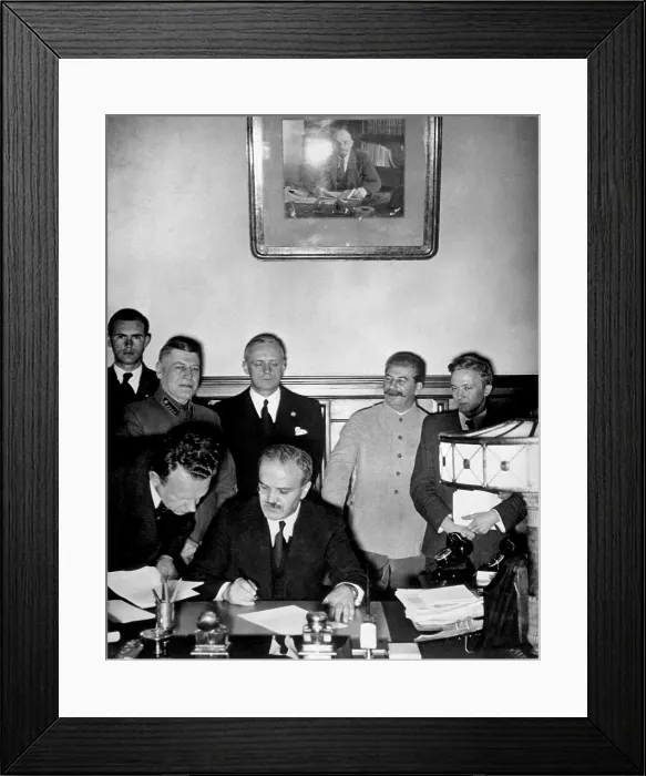 Framed Print : Signing the German-Soviet nonaggression pact in Moscow, August 23, 1939. Soviet Foreign Minister Molotov signs; behind him stand Joachim von Ribbentrop and Josef Stalin Framed Print : Signing the German-Soviet nonaggression pact in Moscow, August 23, 1939. Soviet Foreign Minister Molotov signs; behind him stand Joachim von Ribbentrop and Josef Stalin