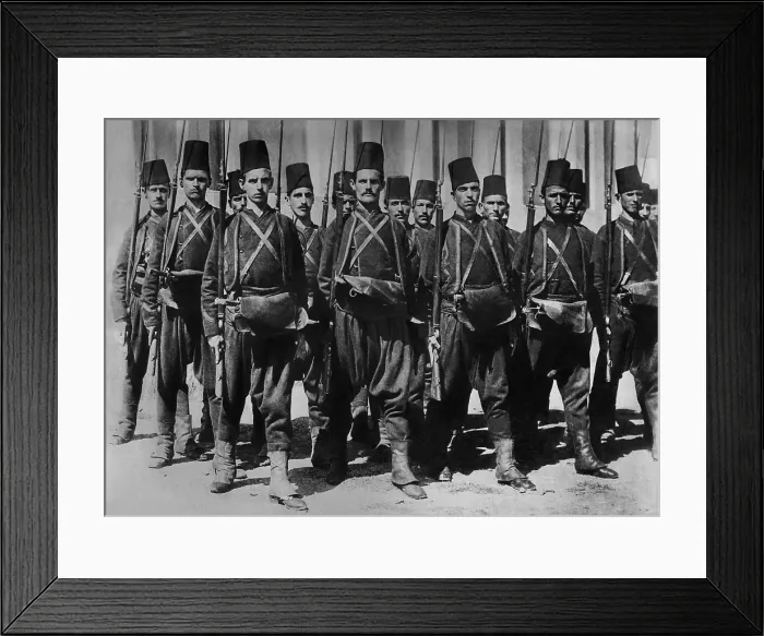 Framed Print : Turkish army c. 1910-1913, in traditional uniforms. They have baggy pants, tunics worn under a short jacket, and the classic fez