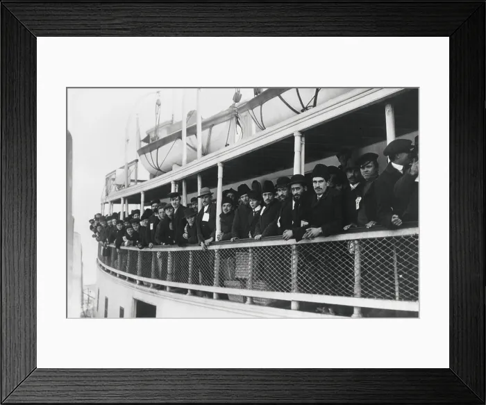 Framed Print : Immigrant men on an Ellis Island Ferry, c. 1905