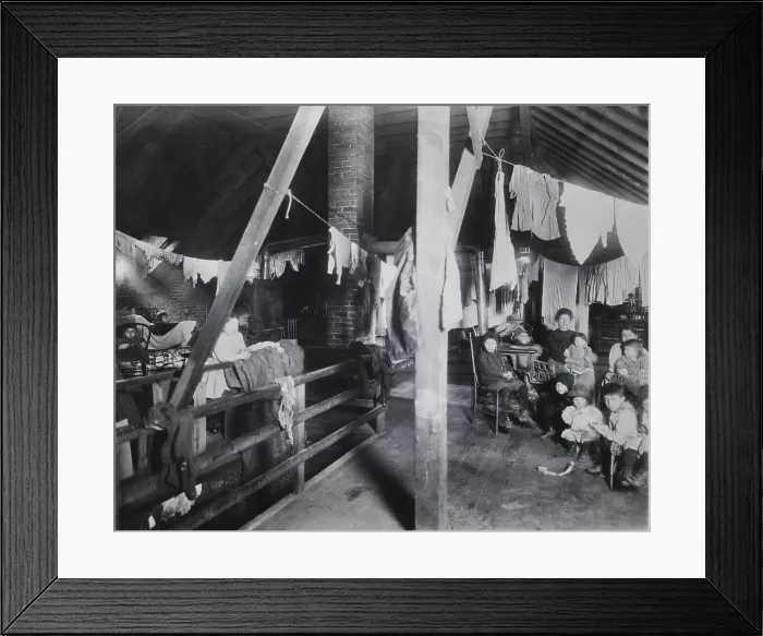 Framed Print : Family in an attic home with drying laundry Framed Print : Family in an attic home with drying laundry