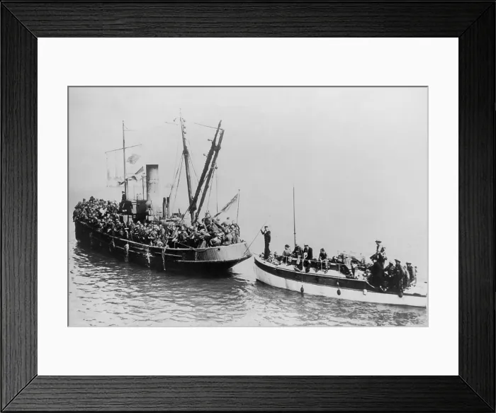 Framed Print : Tug boat with British Expeditionary Forces evacuating Dunkirk, pulls a troops in a small boat. World War 2, May 27-June 4, 1940. (BSLOC_2013_11_76)