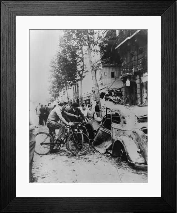 Framed Print : Parisians gather around a car and a home destroyed by German bombs. World War 2, ca. May-June 1940. (BSLOC_2013_11_61)