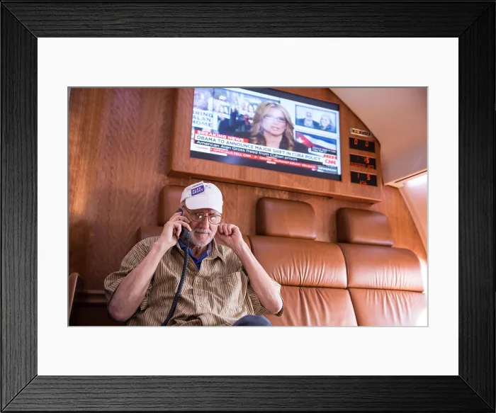 Framed Print : President Barack Obama talks on the phone with Alan Gross after his release from a Cuban prison Framed Print : President Barack Obama talks on the phone with Alan Gross after his release from a Cuban prison