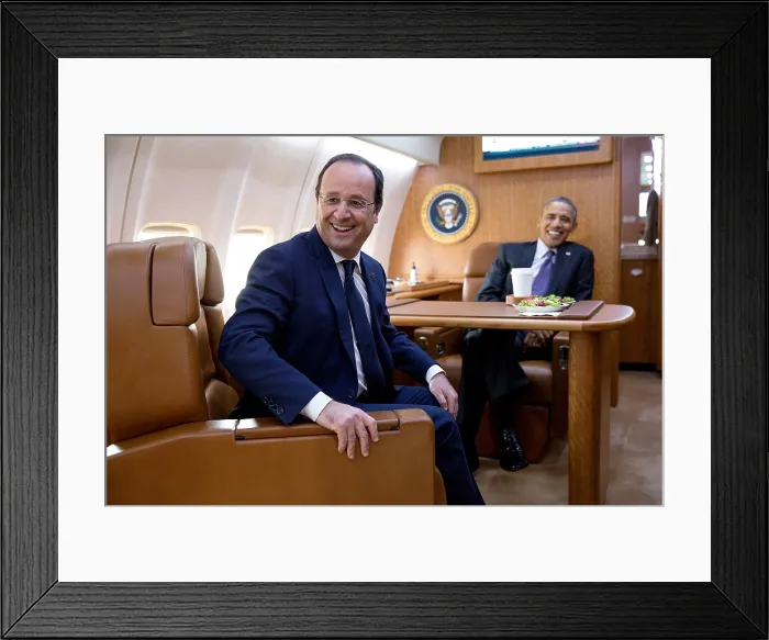 Framed Print : President Barack Obama and President Francois Hollande of France travel aboard Air Force One