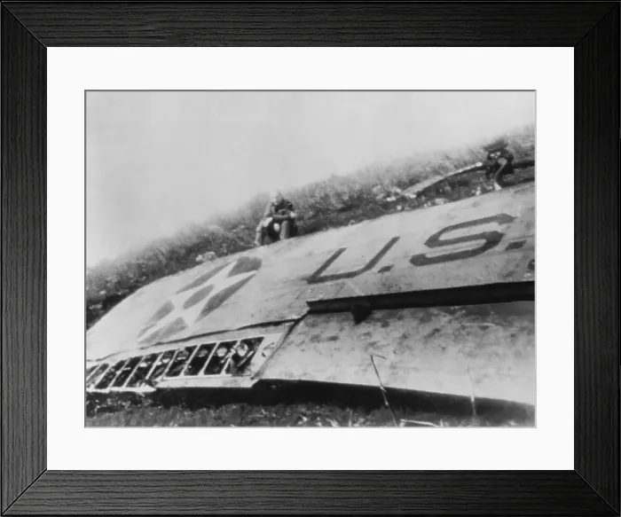 Framed Print : Lt. Col. Jimmy Doolittle sits by a wing of his crash-landed plane somewhere in China Framed Print : Lt. Col. Jimmy Doolittle sits by a wing of his crash-landed plane somewhere in China