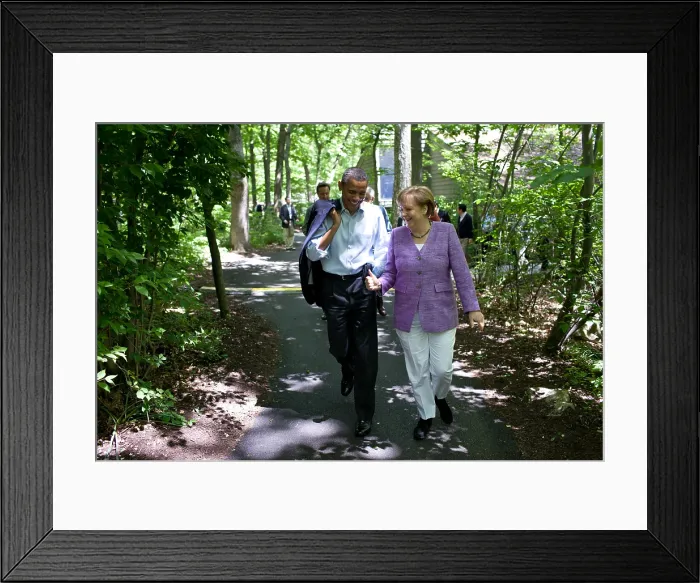 Framed Print : President Barack Obama talks with Chancellor Angela Merkel of Germany during the G8 Summit. They are walking on a path in the woods of Camp David, Maryland, May 19, 2012 Framed Print : President Barack Obama talks with Chancellor Angela Merkel of Germany during the G8 Summit. They are walking on a path in the woods of Camp David, Maryland, May 19, 2012