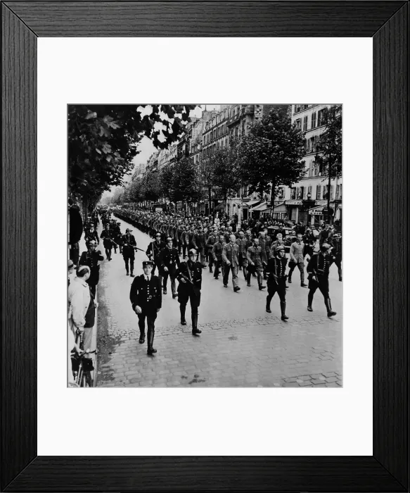 Framed Print : German prisoners march through the streets of Paris, under the guard of French police. August 19-24, 1944, World War 2. (BSLOC_2014_2_141)