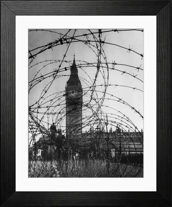 Framed Print : London's Big Ben with barbed wire entanglement and soldiers on guard during World War 2. Ca. 1940-41. (BSLOC_2013_11_83)