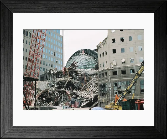 Framed Print : Shattered glass roof of the Winter Garden, at World Financial Center on Sept. 27, 2001. Debris flew over 200 meters from the collapsing of WTC 1, the North Tower