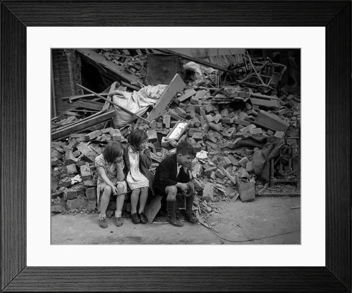 Framed Print : World War 2, Battle of Britain. Homeless children sit outside the wreckage of their home in London's East End, Sept. 1940. (BSLOC_2013_11_93)