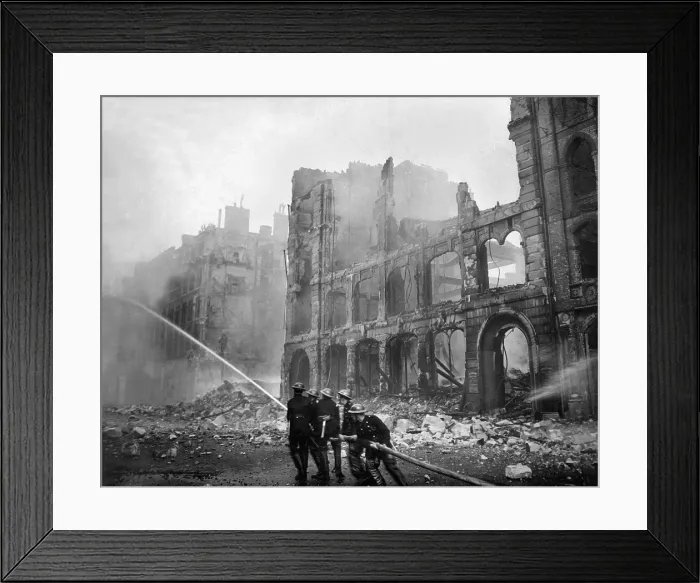 Framed Print : Fire fighting during World War 2 Battle of Britain. Firemen at work in bomb-damaged street in London, after Saturday night raid, ca. 1941. (BSLOC_2013_11_85)