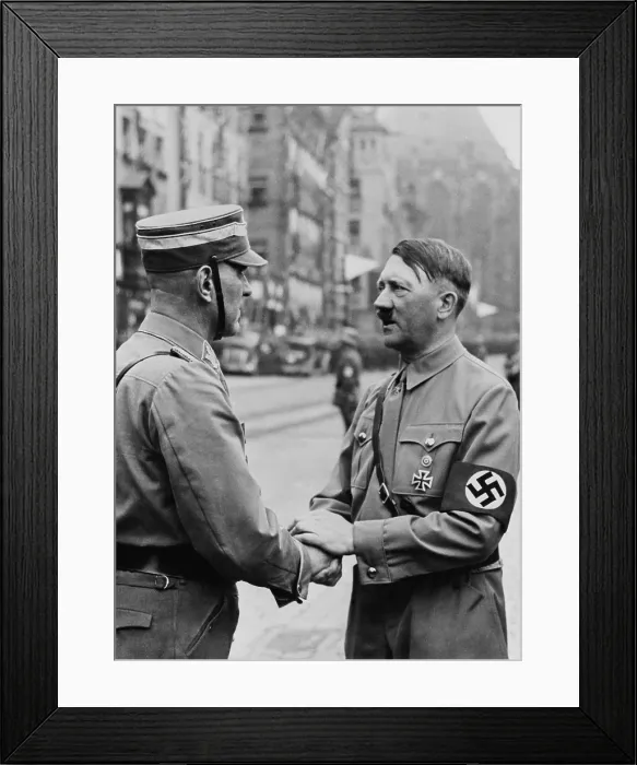 Framed Print : German Chancellor, Adolf Hitler, shaking hands with a Brownshirt at Nazi Party Day. Nuremberg, 1937. (BSLOC_2014_8_166)
