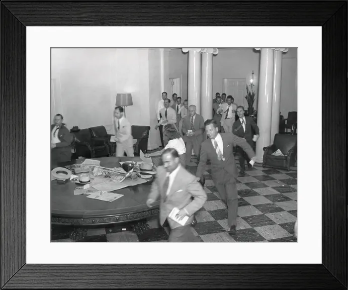 Framed Print : Reporters running through the White House after the announcement of Japan's surrender, ending WW2. August 14, 1945. - (BSLOC_2014_15_20) Framed Print : Reporters running through the White House after the announcement of Japan's surrender, ending WW2. August 14, 1945. - (BSLOC_2014_15_20)