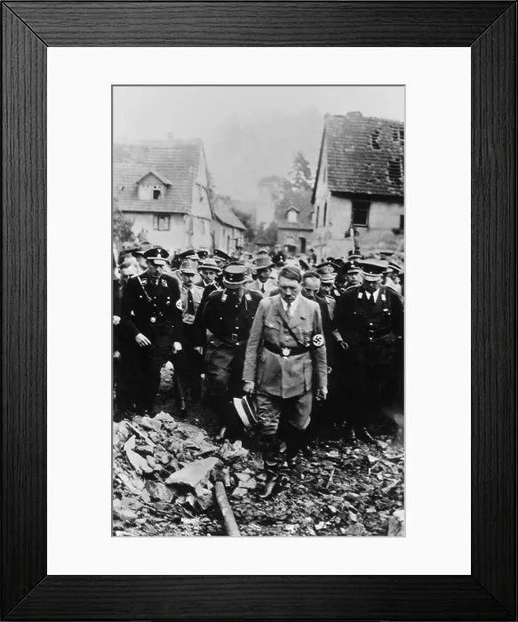 Framed Print : Adolf Hitler, with German military and officials, inspects bomb damage in a German city in 1944. World War 2. (BSLOC_2014_8_167)