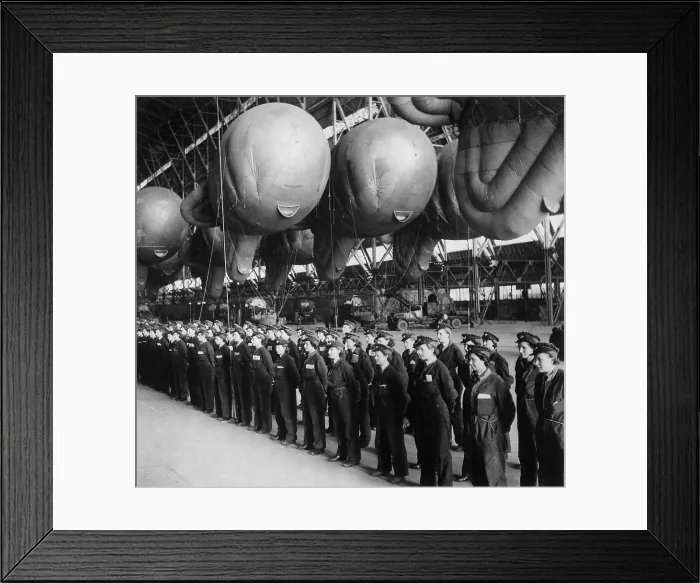 Framed Print : Battle of Britain, World War 2. Women's Auxiliary Air Force balloon operators report for inspection before going off duty after training. Ca. 1940-41. (BSLOC_2013_11_81)