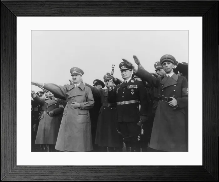 Framed Print : Hitler, with Goering and Goebbels, saluting upon his return from Austria. On the previous day Hitler signed the unification pact annexing Austria into Germany Framed Print : Hitler, with Goering and Goebbels, saluting upon his return from Austria. On the previous day Hitler signed the unification pact annexing Austria into Germany