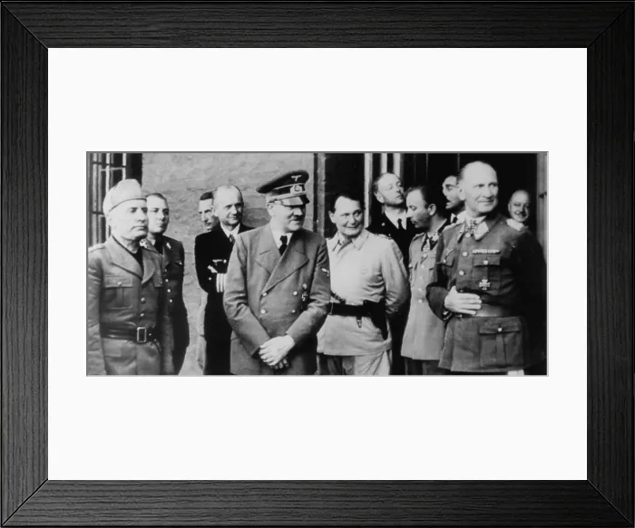 Framed Print : Adolf Hitler, wearing a bandage on his left hand from an assassination attempt of July 20, 1944. L-R: Mussolini, Martin Borman, unidentified, Adm Framed Print : Adolf Hitler, wearing a bandage on his left hand from an assassination attempt of July 20, 1944. L-R: Mussolini, Martin Borman, unidentified, Adm