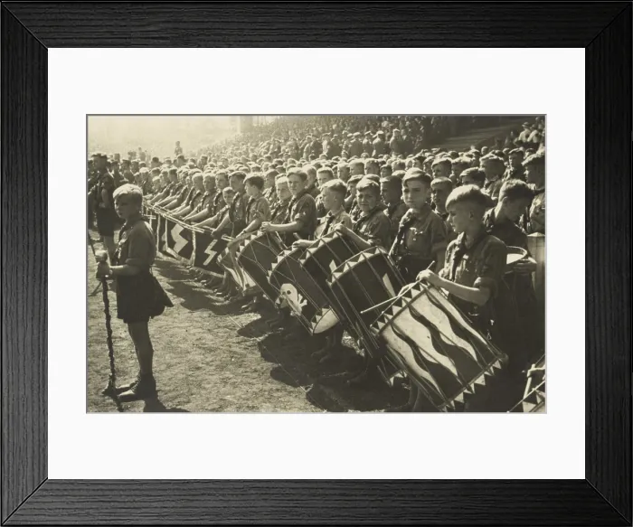 Framed Print : Hitler Youth drum corps at a rally. Their drums bear skull and runics symbols of the Elite Nazi SS troops. Ca. 1935-39. (BSLOC_2014_7_16)