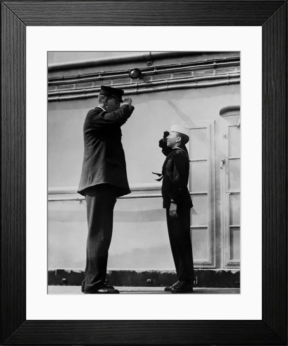Framed Print : On the WW1 troop ship, USS Leviathan, the ships tallest and shortest sailor salute each other. The taller is the Chief Machinists Mate (BSLOC_2017_1_17)
