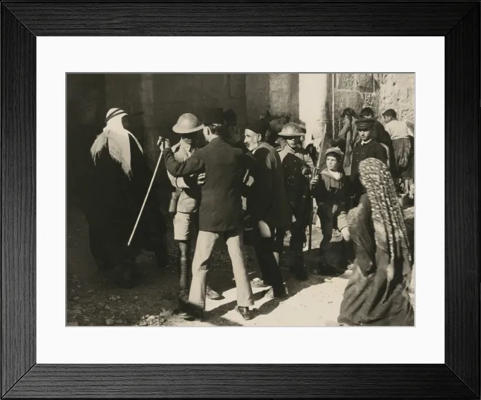Framed Print : British soldiers search Arab men for weapons in Jerusalem on Nov. 2nd, 1921