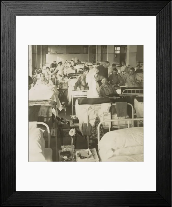 Framed Print : Wounded American soldiers in the New York City Convalescent Hospital No. 5. during World War 1. Nurses attend recovering men in a packed ward in 1917-1918 (BSLOC_2017_1_16)