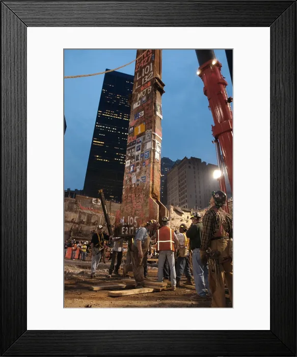Framed Print : Construction workers maneuver the last piece of debris removed from Ground Zero. May 28, 2002 Framed Print : Construction workers maneuver the last piece of debris removed from Ground Zero. May 28, 2002