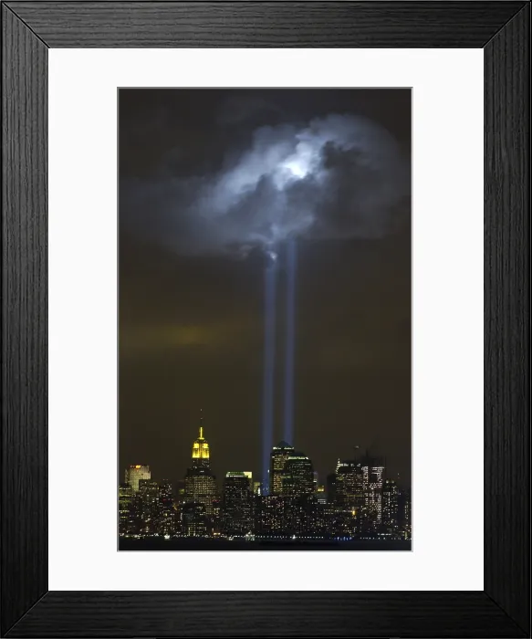 Framed Print : Tribute in Light Memorial illuminates a passing cloud above lower Manhattan. Sept. 9, 2004