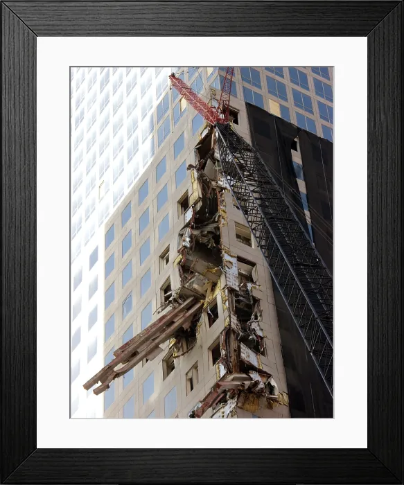 Framed Print : Steel beams of the North Tower embedded in the side of the World Financial Center. Oct. 12, 2001. New York City, after September 11, 2001 terrorist attacks. (BSLOC_2015_2_118)