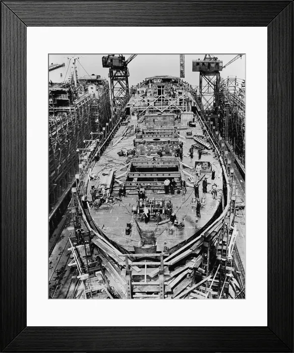 Framed Print : On the fourteenth day of the construction of a Liberty Ship. The upper deck mast houses and after-deck house are in place. Bethlehem Fairfield shipyards near Baltimore Maryland