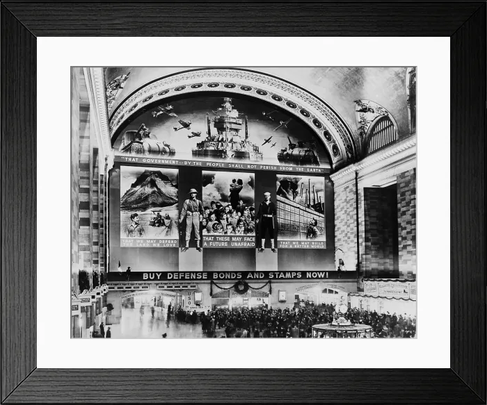 Framed Print : Grand Central terminal Mural. A huge photo mural above the Grand Central Station Concourse promotes Defense Bonds and Stamps. 1942