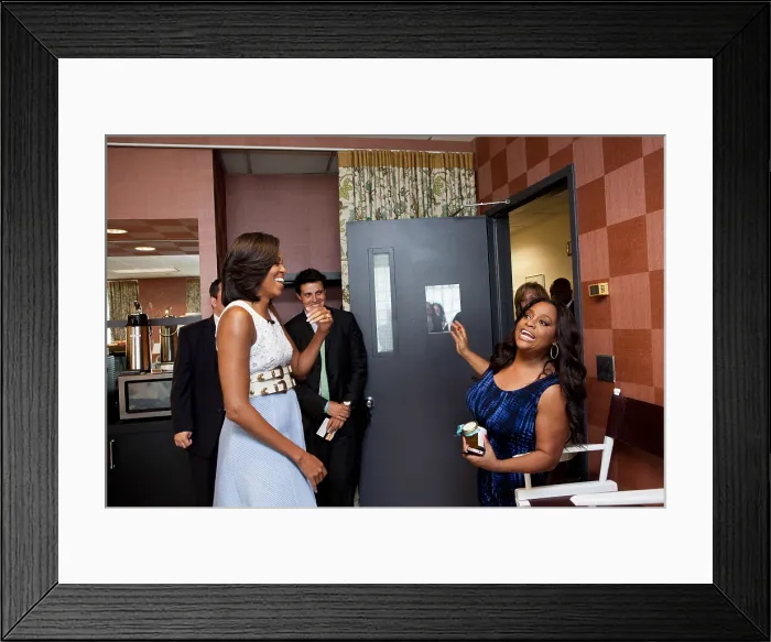 Framed Print : First Lady Michelle Obama greets Sherri Shepherd of The View at the show's New York studio. May 29, 2012 (BSLOC_2015_3_116)