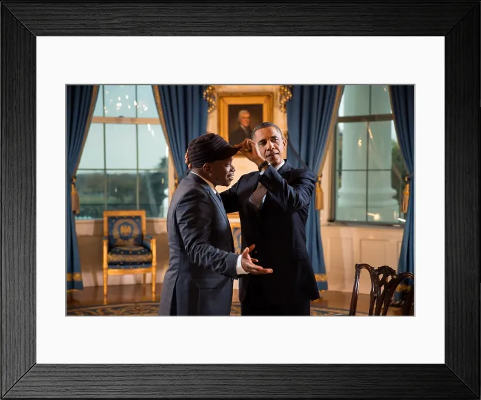 Framed Print : President Barack Obama adjusts Sway Calloway's hat in the Blue Room of the White House. The President gave an interview for a Live MTV special. Oct