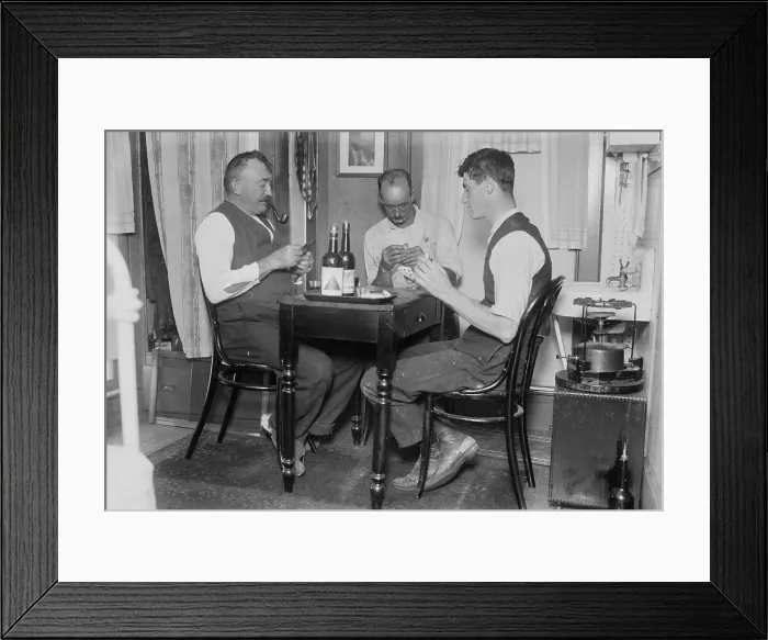 Framed Print : Two men playing cards in a home in Broad Channel, Queens, New York, c. 1910 Framed Print : Two men playing cards in a home in Broad Channel, Queens, New York, c. 1910