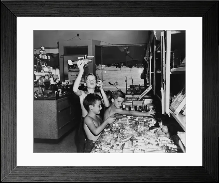 Framed Print : Three boys playing with toys in a store, Greenbelt, Maryland. 1946. (BSLOC_2014_13_165)