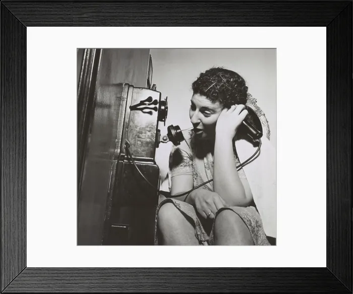 Framed Print : Young women on the public telephone installed in a Washington, D.C. boardinghouse. Jan. 1943. (BSLOC_2014_13_168) Framed Print : Young women on the public telephone installed in a Washington, D.C. boardinghouse. Jan. 1943. (BSLOC_2014_13_168)