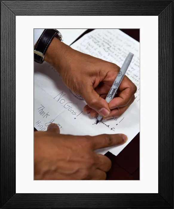 Framed Print : President Obama signs letters from children on their concerns about gun violence and school safety. Jan. 16, 2013