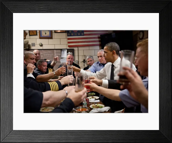 Framed Print : President Barack Obama and Pride of Midtown firefighters toast at lunch on May 5, 2011 Framed Print : President Barack Obama and Pride of Midtown firefighters toast at lunch on May 5, 2011