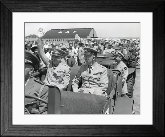Framed Print : Generals Dwight Eisenhower and George Marshall sitting in a jeep at a Washington D.C. airport. Eisenhower is waving and smiling, contrasting with the restrained Marshall