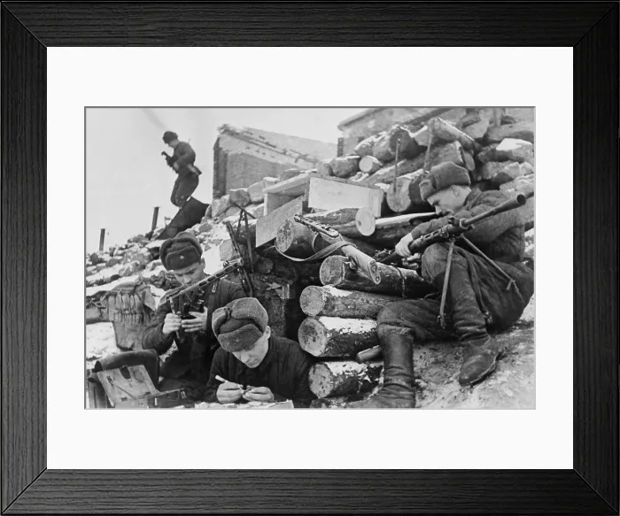 Framed Print : Battle for Stalingrad, World War 2. Soviet troops, at a fortified position, cleaning their weapons. The soldier in foreground appears to be repairing watches. Nov-Dec