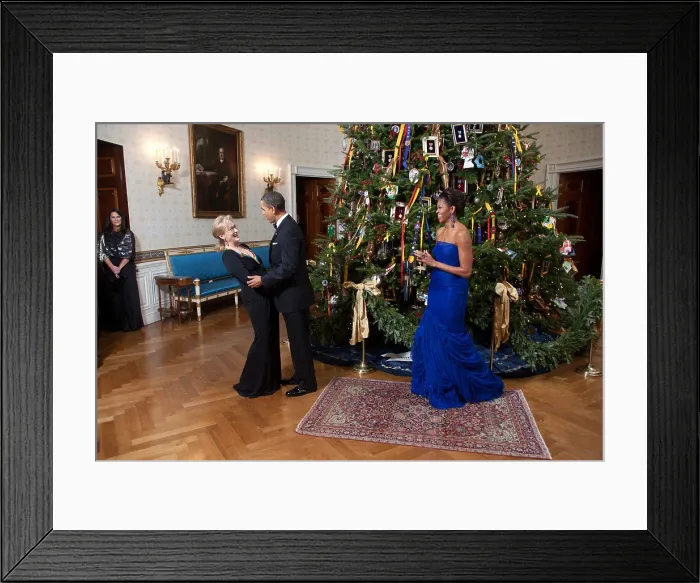 Framed Print : Kennedy Center honoree Meryl Streep with President Barack Obama and First Lady Michelle Obama. In the Blue Room of the White House decorated for Christmas, Dec. 4, 2011
