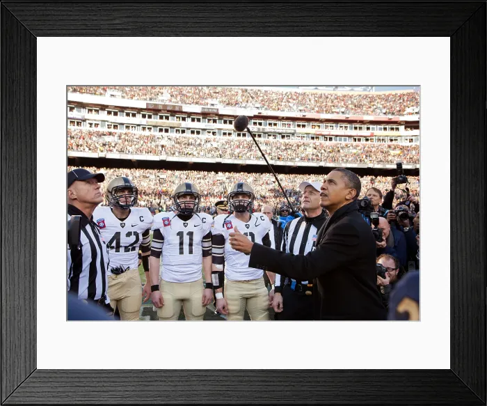 Framed Print : President Barack Obama performs the coin toss before the annual Army vs. Navy football game. Landover, Md. Saturday, Dec. 10, 2011. (BSLOC_2015_3_135)