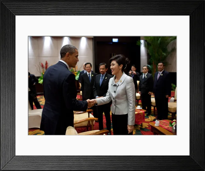 Framed Print : President Barack Obama greets Prime Minister Yingluck Shinawatra of Thailand. At the ASEAN Summit in Nusa Dua, Bali, Indonesia, Nov. 18, 2011. (BSLOC_2015_3_143) Framed Print : President Barack Obama greets Prime Minister Yingluck Shinawatra of Thailand. At the ASEAN Summit in Nusa Dua, Bali, Indonesia, Nov. 18, 2011. (BSLOC_2015_3_143)