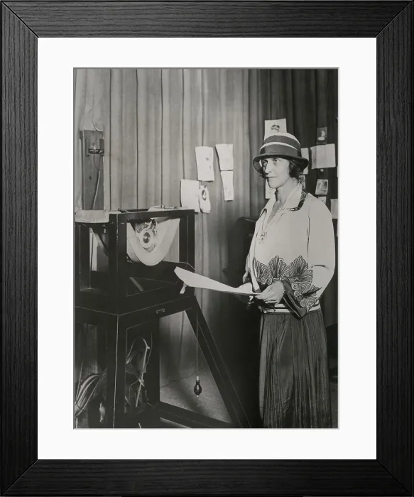 Framed Print : Nancy Astor, American born member of British Parliament, speaking into an early microphone, 1920s