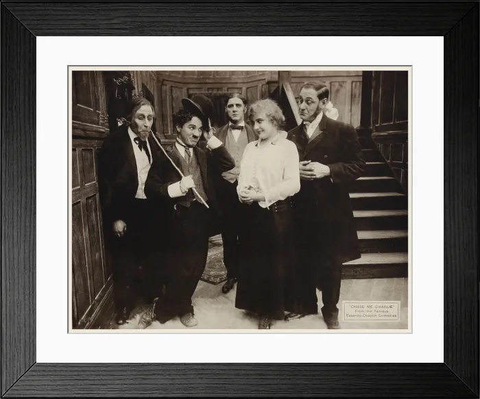 Framed Print : CHASE ME CHARLIE, US lobbyard, second from left: Charlie Chaplin 1918