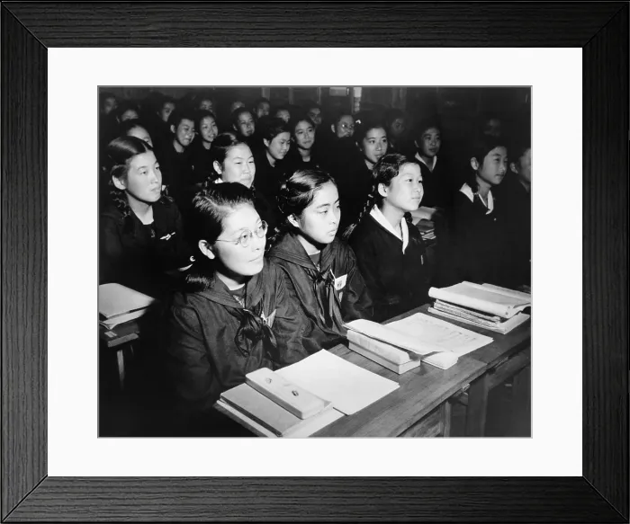 Framed Print : Japanese girls seated at desks in newly rebuilt Catholic school in Tokyo, Japan. The teenagers helped rebuild the school. Oct. 31, 1946. - (BSLOC_2014_15_131)