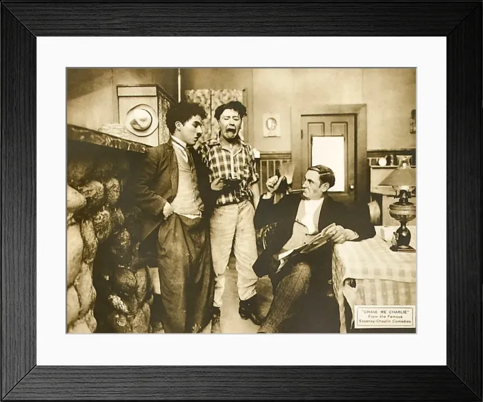Framed Print : CHASE ME CHARLIE, left: Charlie Chaplin on lobbycard, 1918 Framed Print : CHASE ME CHARLIE, left: Charlie Chaplin on lobbycard, 1918