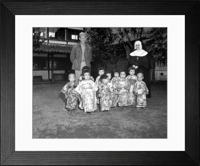 Framed Print : Angel Guardian Home, a Catholic home for orphans, in Kumanoto, Japan. Sister St. Paul had the orphans dress in their finest clothes to have their picture taken by a U.S