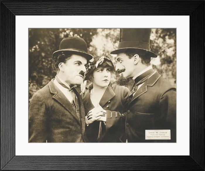 Framed Print : CHASE ME CHARLIE, left: Charlie Chaplin on lobbycard, 1918 Framed Print : CHASE ME CHARLIE, left: Charlie Chaplin on lobbycard, 1918
